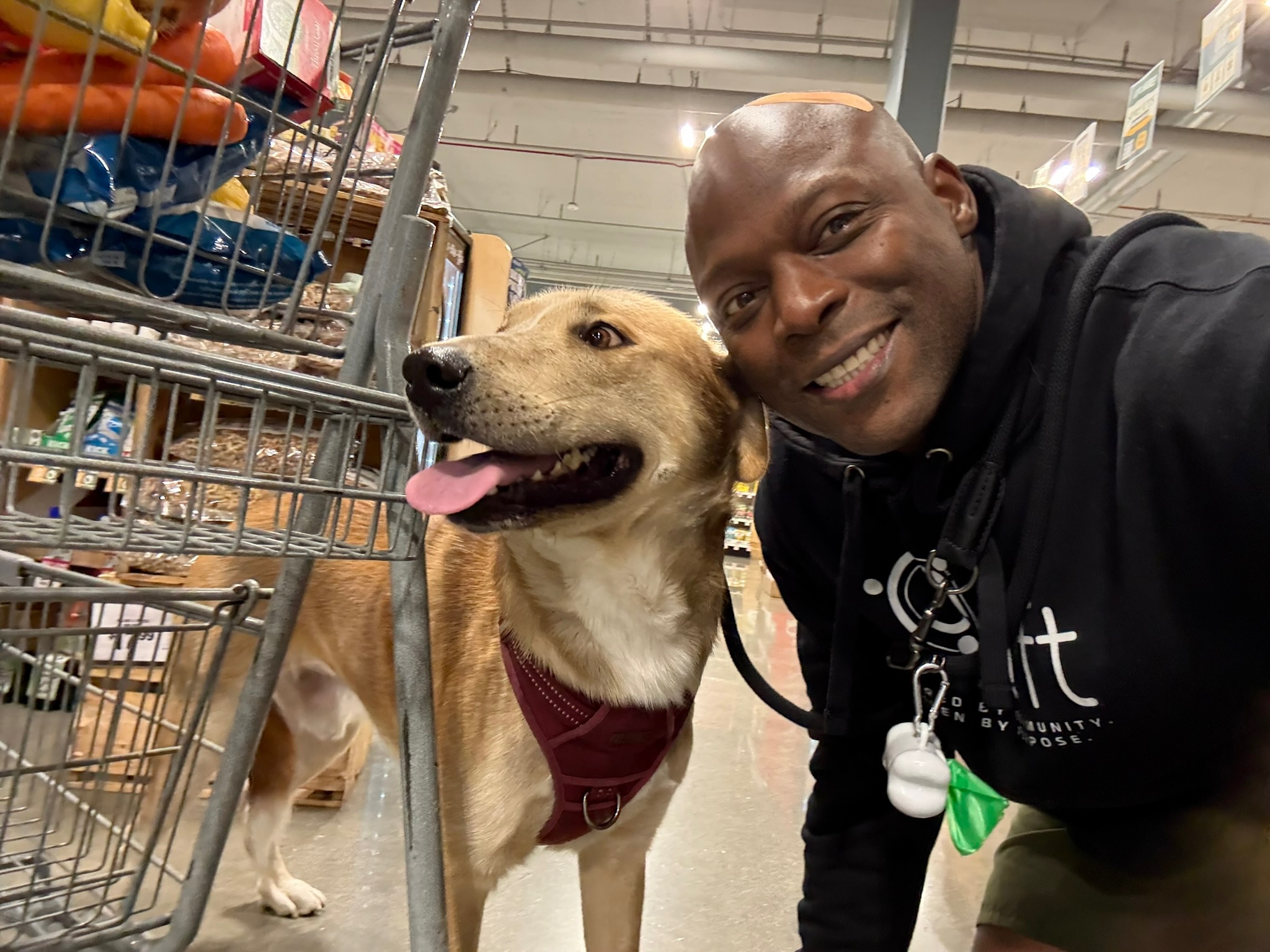 Dario smiling beside Uncle Ruckus during a shopping trip